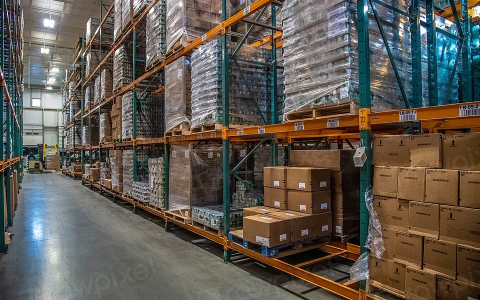 Stocked warehouse shelves of boxed inventory ready to ship